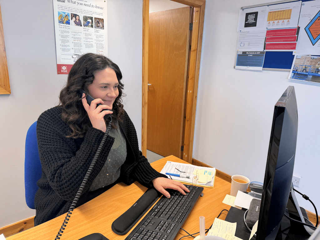 Kirstie Park at her desk at Brick-Tie Preservation