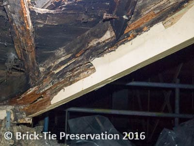 Fig 5 This large section hip rafter in a roof in Tadcaster is badly decayed by a brown wet rot. The valley lining boards and jack rafter feet have also been destroyed.