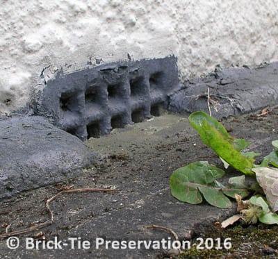 Fig 4: Oh dear – buried air bricks like this can lead to wet rot and worse… the render in contact with the ground can also cause damp